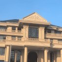 昆明黄金麻别墅外墙干挂石材效果示例