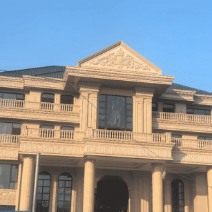 昆明黄金麻别墅外墙干挂石材效果示例